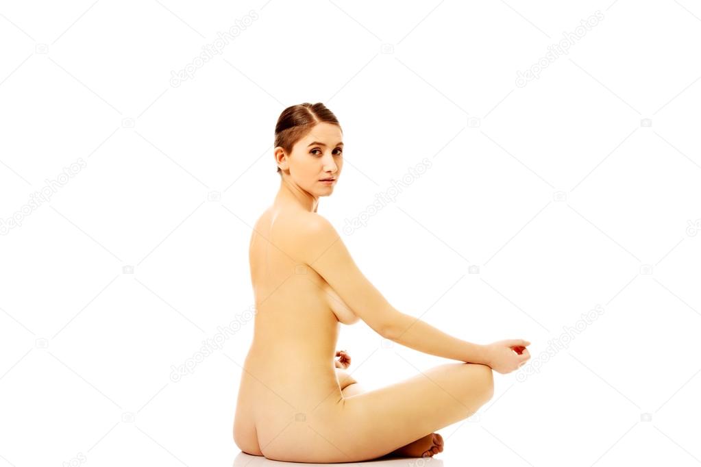 https://st2n.depositphotos.com/1003556/10836/i/950/depositphotos_108361018-stock-photo-young-naked-woman-sitting-on.jpg