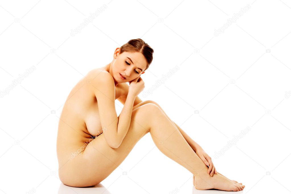 https://st2n.depositphotos.com/1003556/10836/i/950/depositphotos_108361438-stock-photo-young-naked-woman-sitting-on.jpg