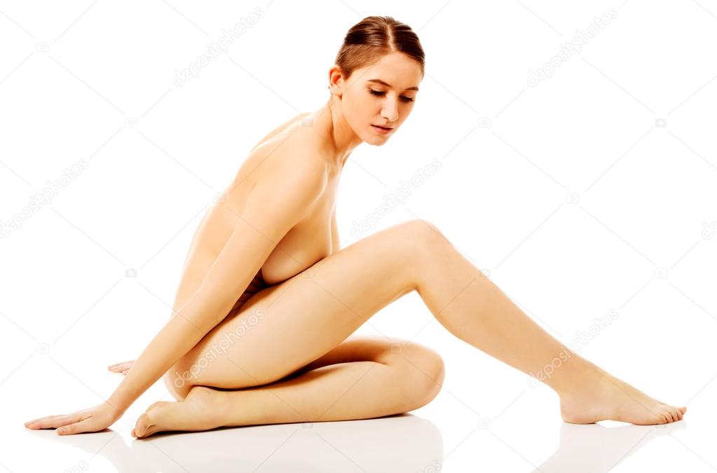 https://st2n.depositphotos.com/1003556/10836/i/950/depositphotos_108361798-stock-photo-young-naked-woman-sitting-on.jpg