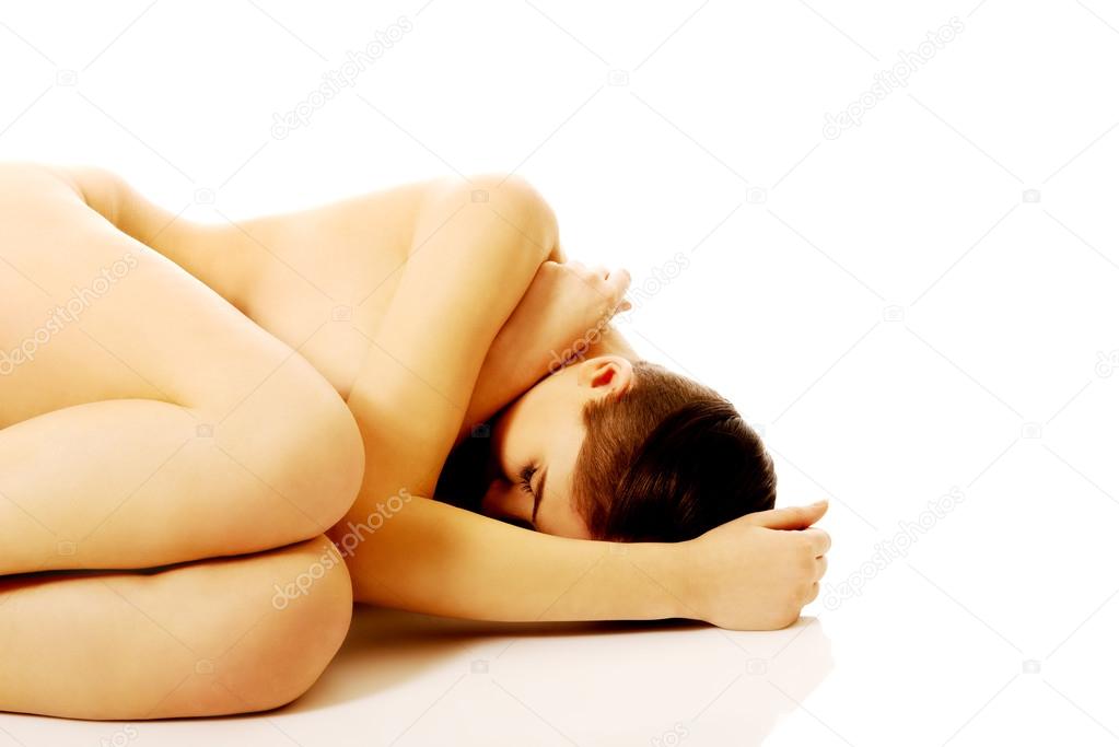 https://st2n.depositphotos.com/1003556/10836/i/950/depositphotos_108361980-stock-photo-young-naked-woman-sitting-on.jpg