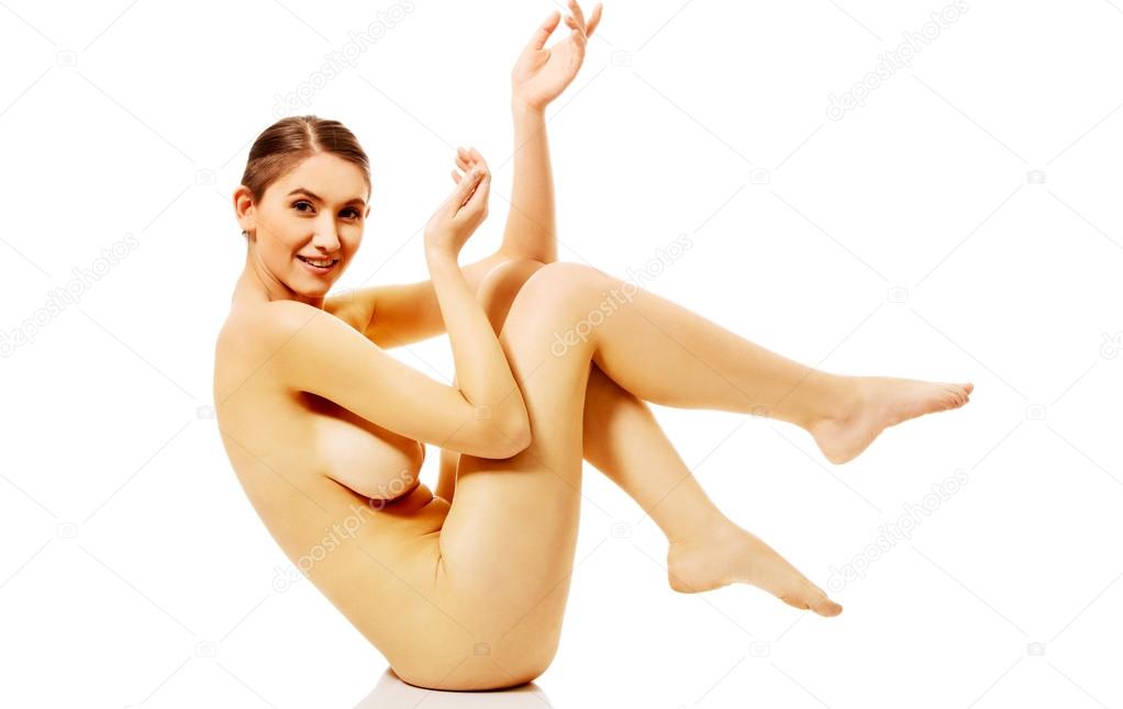 https://st2n.depositphotos.com/1003556/10836/i/950/depositphotos_108362358-stock-photo-young-naked-woman-sitting-on.jpg