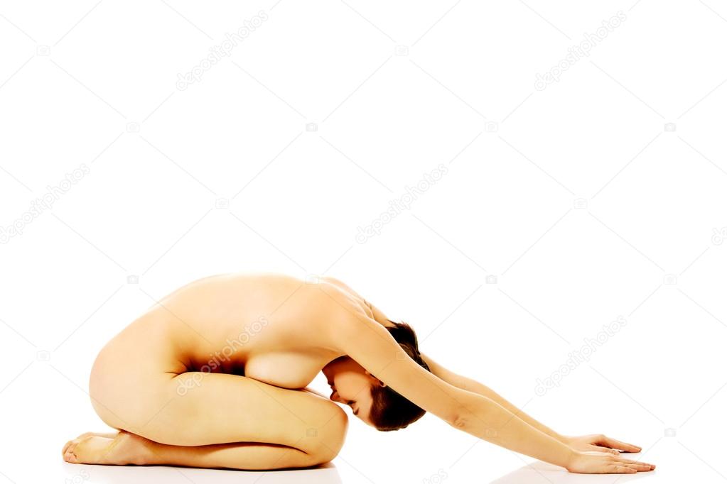https://st2n.depositphotos.com/1003556/10836/i/950/depositphotos_108362570-stock-photo-young-naked-woman-sitting-on.jpg