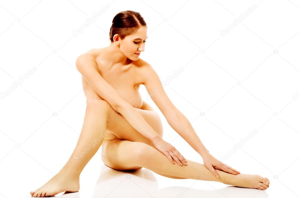 https://st2n.depositphotos.com/1003556/10836/i/950/depositphotos_108362966-stock-photo-young-naked-woman-sitting-on.jpg