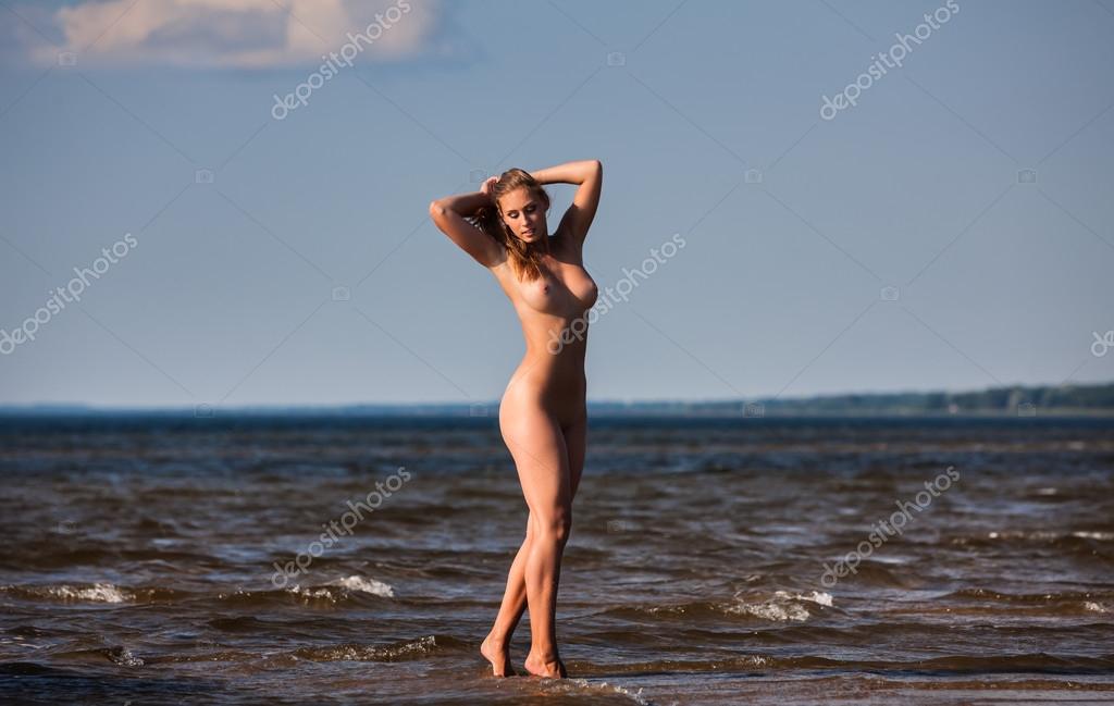 https://st2n.depositphotos.com/1005647/6393/i/950/depositphotos_63931987-stock-photo-young-naked-woman-enjoying-nature.jpg