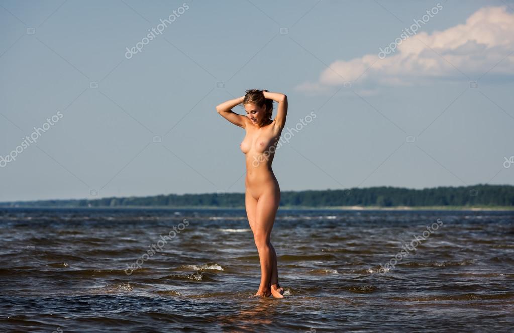 https://st2n.depositphotos.com/1005647/6393/i/950/depositphotos_63931989-stock-photo-young-naked-woman-enjoying-nature.jpg