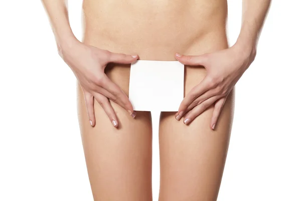 Bucată albă de hârtie peste vagin — Fotografie, imagine de stoc